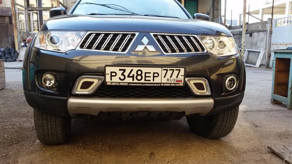 ПТФ Паджеро спорт 2. Фара Pajero Sport 2. ПТФ Pajero Sport 2. Доп свет на Паджеро спорт 2. Фары pajero sport