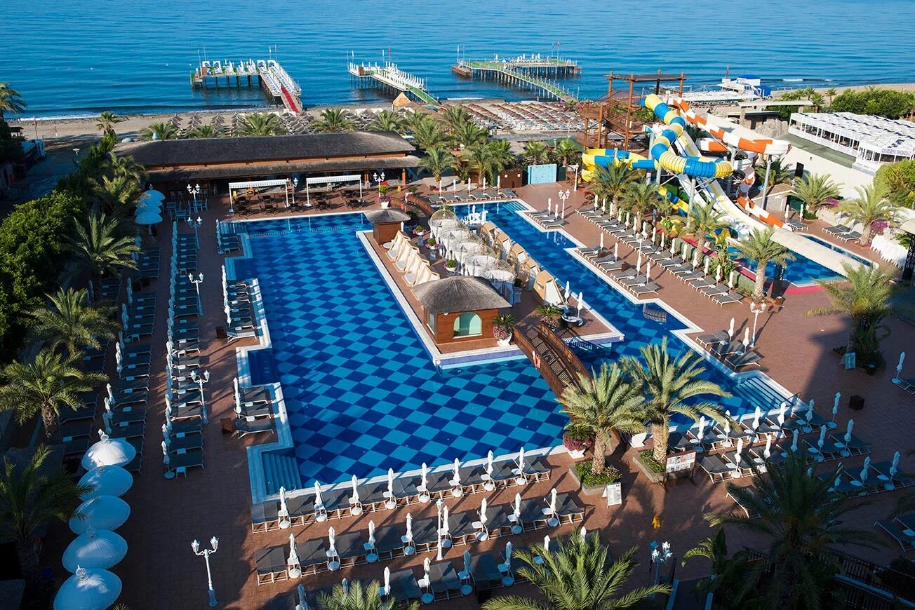 Кватро бич резорт алания. Алания отель кватро бич резорт. Отель в турции кватро бич резорт. Кватро бич спа резорт турция. Кватро бич алания.