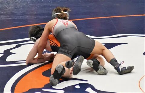 woman wrestler beats a guy.