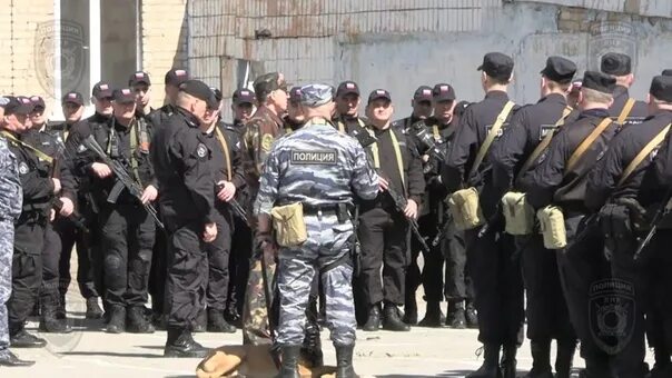 Сотрудник полиции лнр. Сводный отряд российской полиции. сводный отряд полиции в луганске. сводные отряды полиции россии на украине. отряд мвд рф на украине.