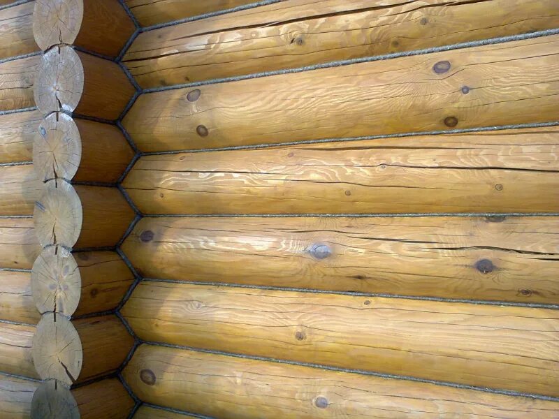 теплый шов реммерс. конопатка оцилиндрованного сруба. конопатка сруба мхом. конопатка кантиком. конопатка бани из бруса.