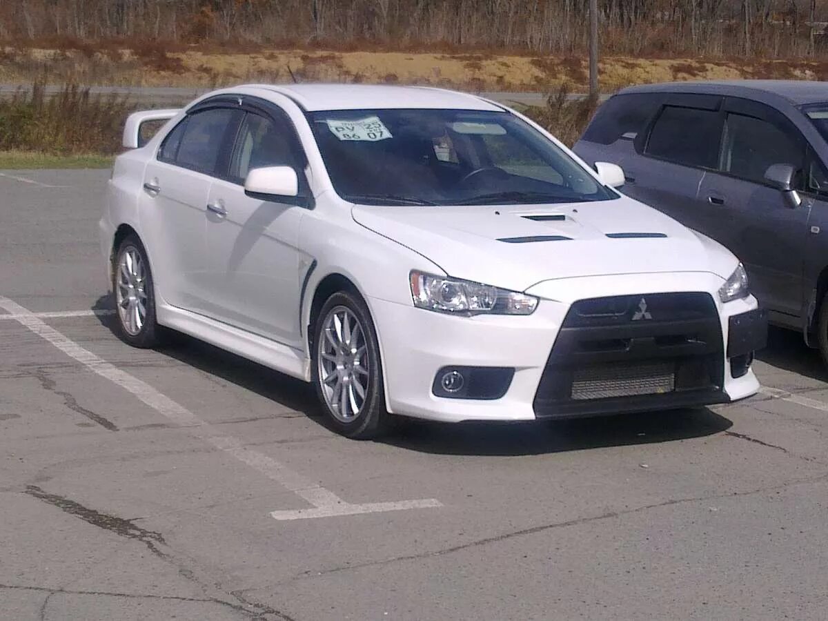 Митсубиси лансер 2010. Mitsubishi Lancer 2010. Mitsubishi Lancer EVO 2010. Lancer Evolution 2010. Митсубиси Lancer EVO 2010.