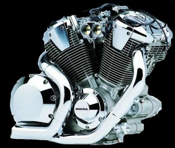 V твин двигатель. Двигатель honda 614 см3 v twin. Двигатель v-twin 400cc. V twin. Харлей дэвидсон двигатель twin-cam.