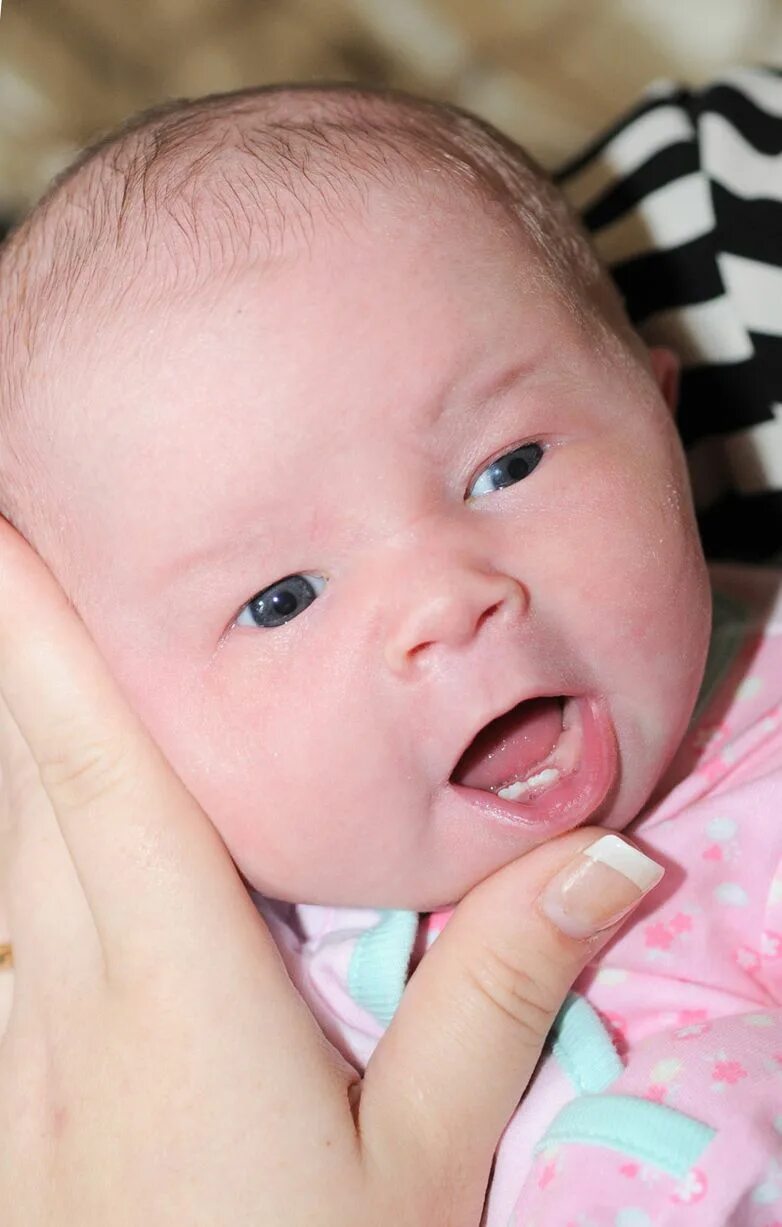 New mum stunned after baby girl born with a fully formed TOOTH The Sun