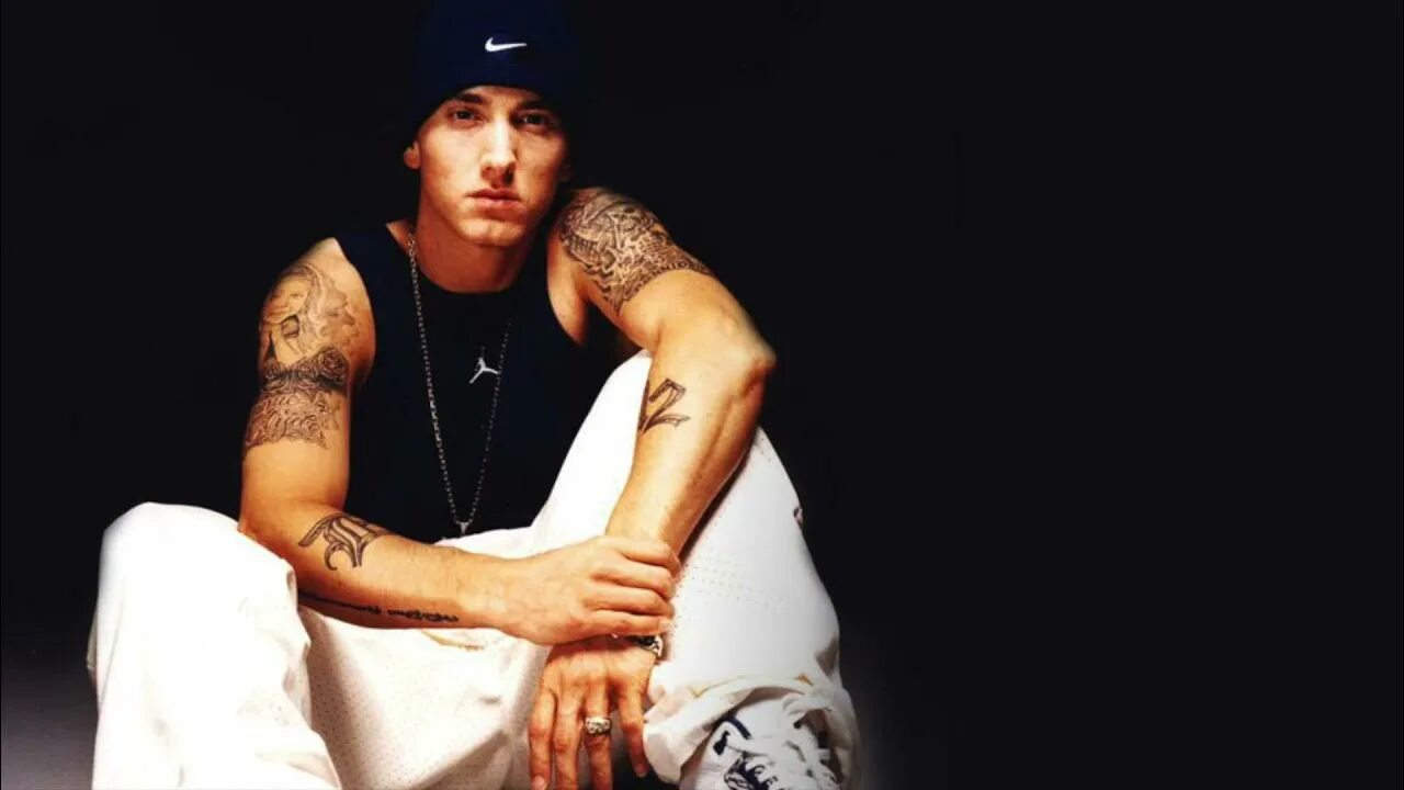 Песня быстрый рэп. Тату Эминема. Эминем 1990. Eminem в молодости. Эминем 2014.