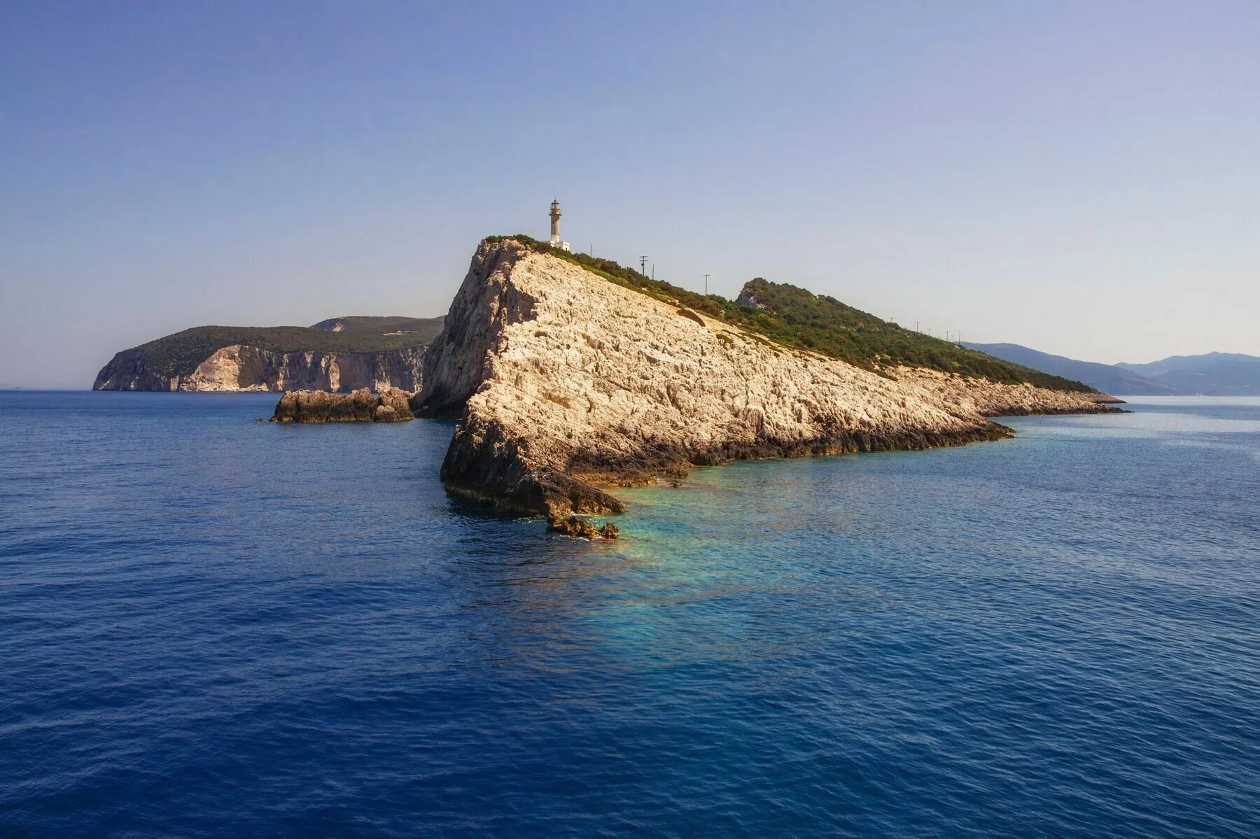 Ancient island. Маяк Андрос Греция. Мыс Лефкас Греция. Ионическое море Корфу. Лефкас Василики Греция.