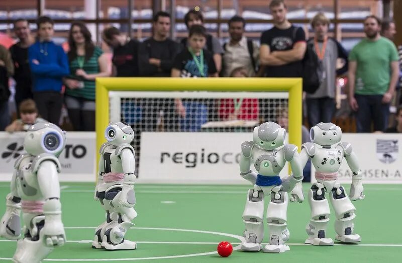 Турнир роботов по футболу. Турнир ROBOCUP. Футбол среди роботов. Соревнования по футболу среди роботов.