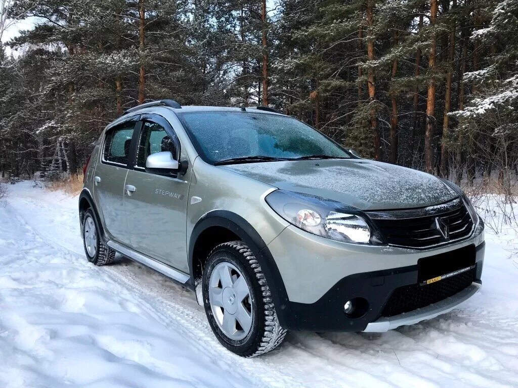 Renault sandero 2012. Сандеро степвей 2014. Рено Сандеро степвей 1. Рено Сандеро степвей 2014. Renault Sandero Stepway 2014.