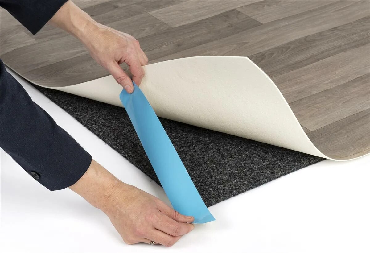Roll floor. Rolling floor rag. vinyl roll. popped up floorboard.