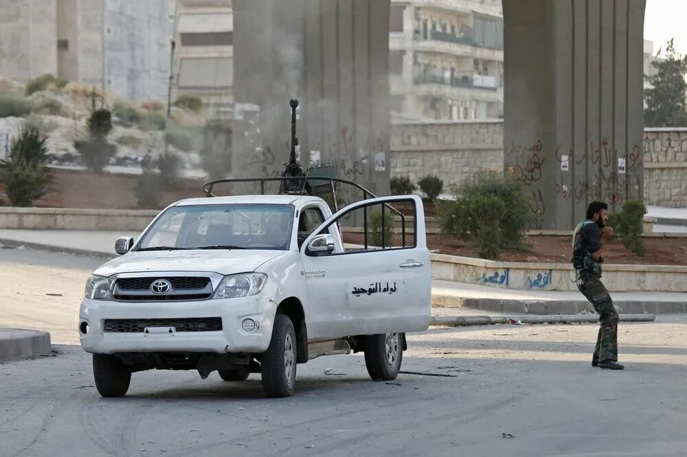 Пикап с окончанием. Toyota Hilux DSHK. Тойота с ДШК. Хайлюкс с ДШК. Тойота с ДШК Палестины.