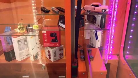 Выиграть телефон в автомате