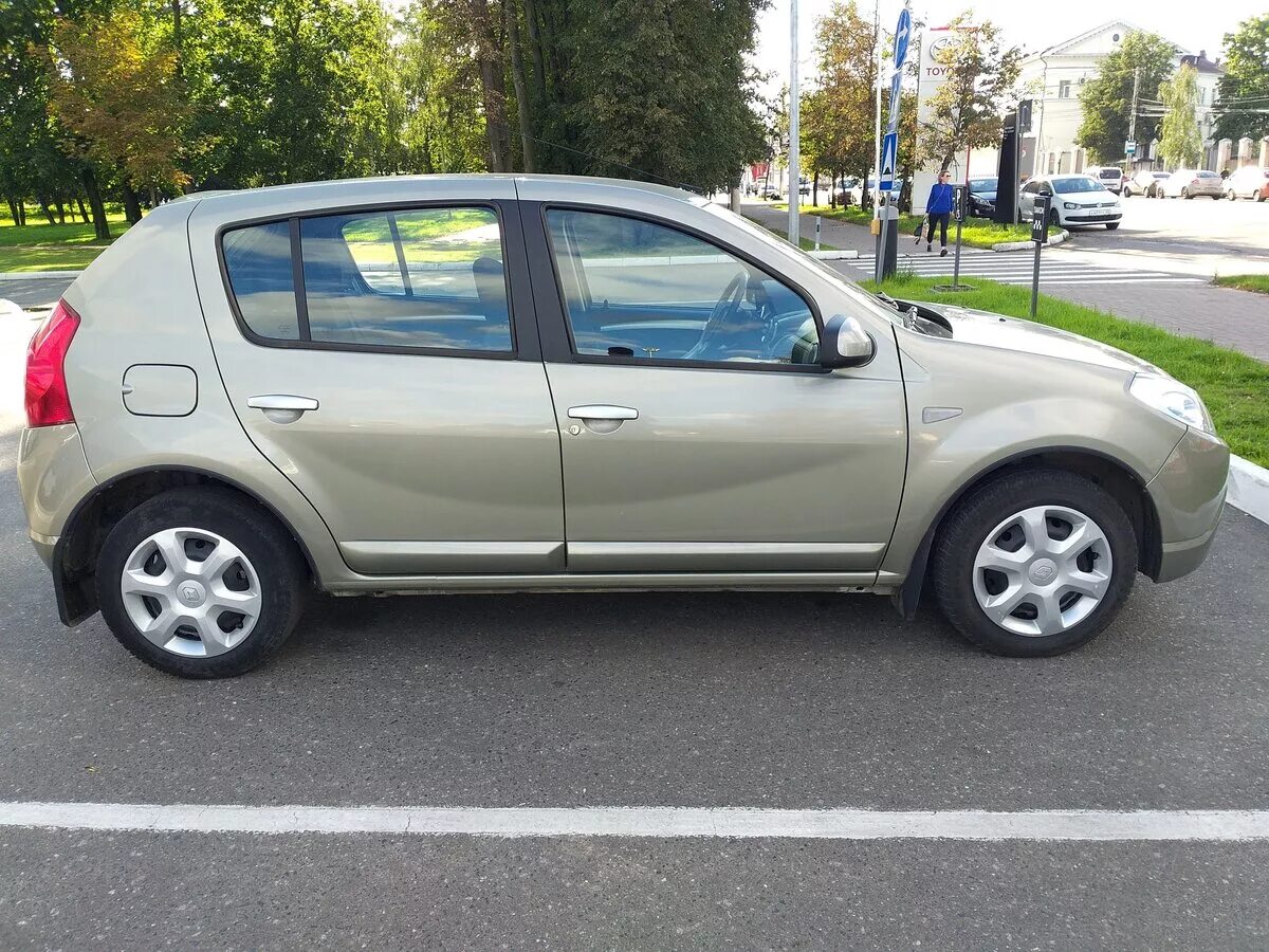 Renault sandero 2012. Sandero 2012. Ренаулт Сандеро 2012. Renault Sandero 2012 бежевый. Рено Сандеро 2012.