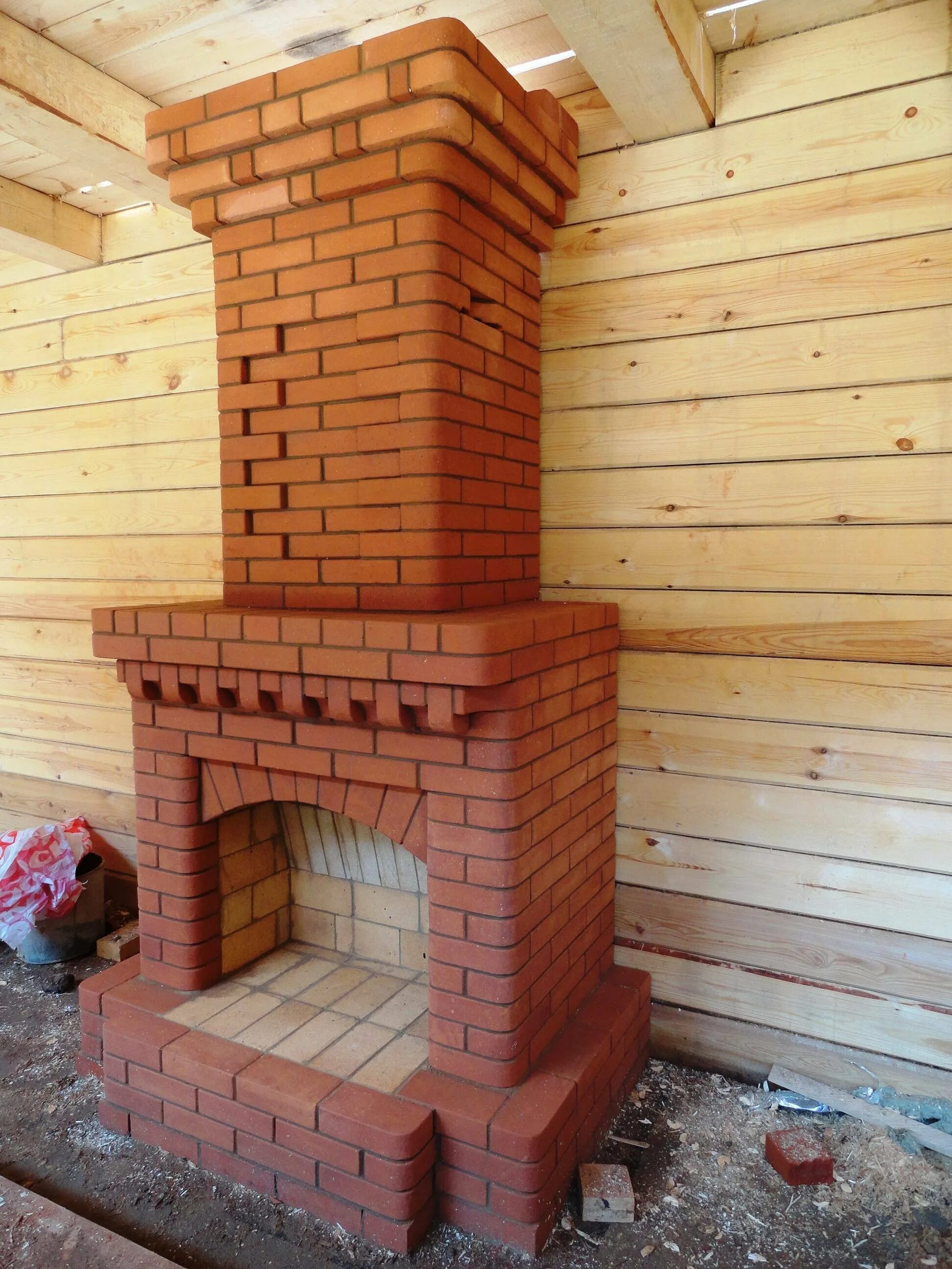 Небольшой кирпичный камин. Небольшой кирпичный камин. Печь отопительная кирпичная 500х1250. Открытый камин из кирпича. Сделать камин из кирпича.