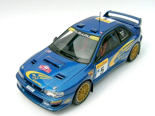 Субару 1.5 купить. Subaru Impreza Rally 1999. AUTOART Subaru Impreza 1 18. Impreza WRC 1999 Rally. Субару Импреза Автоарт 1 18.