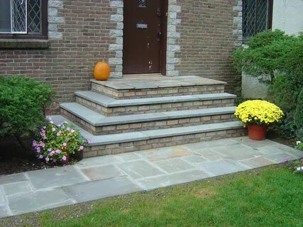 I like the three lower steps, but with grey stone (not brick) on the vertic...
