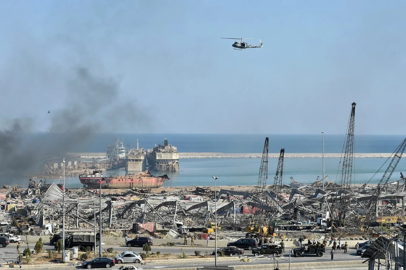 Самолет бейрут. Порт Чикаго взрыв. Реконструкция порта в Бейруте. Маяк в бейрутском порту. Бейрут взрыв хранилища нефтяное.