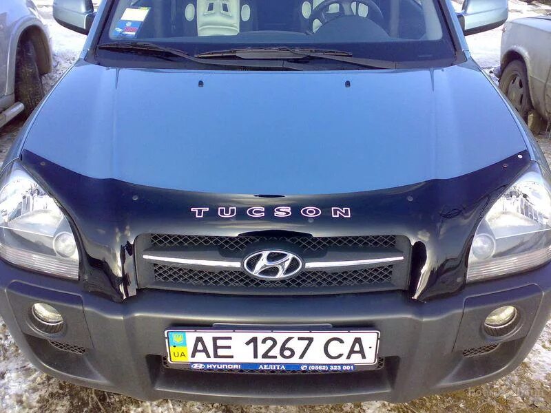 Дефлектор капота Hyundai Tucson 1. Мухобойка Hyundai Tucson. Hyundai Tucson 2004-2009 мухобойка дефлектор капота EGR. Дефлектор капота (мухобойка) на Hyundai Tucson 2004-2008.