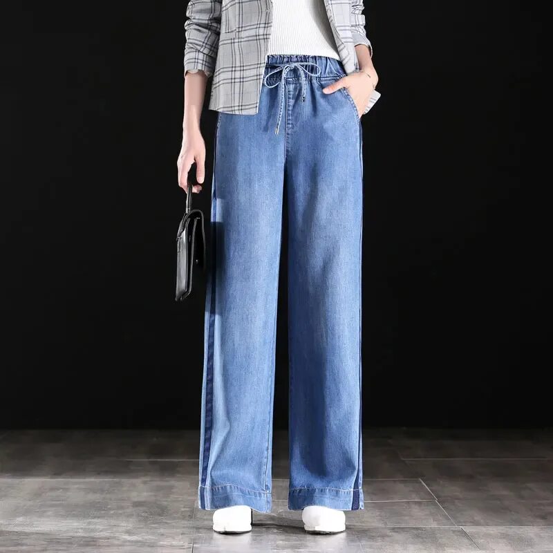 Как называются джинсы широкие от бедра. Прямые широкие джинсы женские. Широкие штаны женские джинсы. Джинсовые брюки женские широкие. Широкие джинсы трубы.