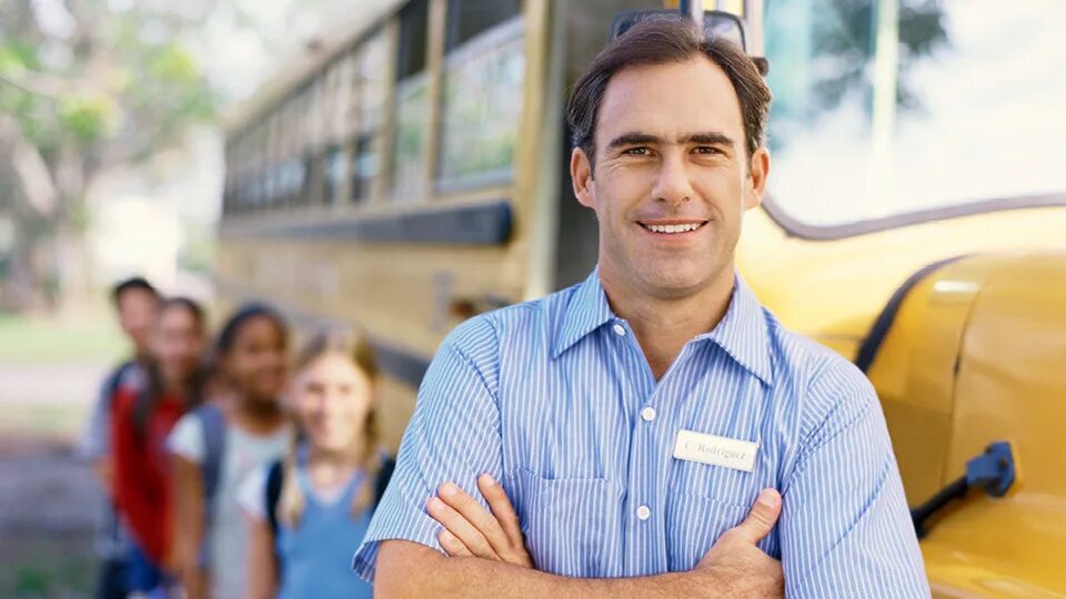 Here come the bus. Bus driver. driving a bus. important people. bus driver picture.