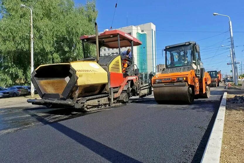 Благоустройство дорог. Асфальтирование. Укладка асфальта г. Асфальтирование дороги. Дорожное покрытие.