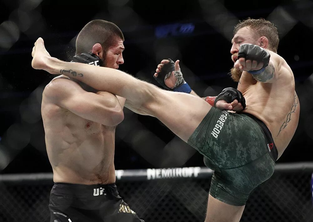 Нурмагомедов магомед боец. Бой фергюсона нурмагомедов. Фото хабиб нурмагомедов ufc. Под выход хабиба. Бойцы юфс хабиб.