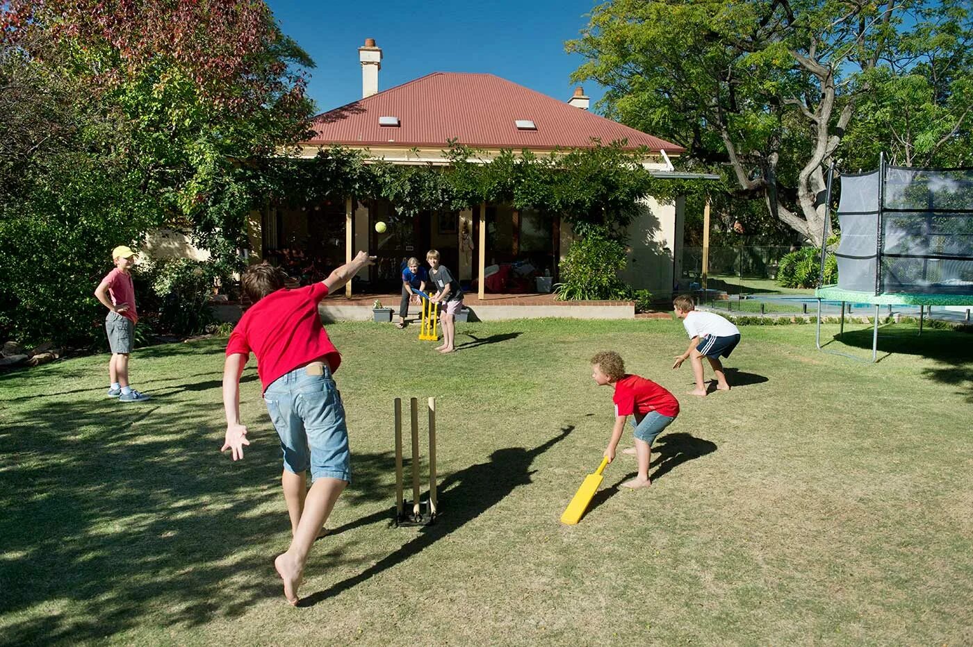 Child yard. Children playing in the Yard. Backyard Cricket. Boys playing in the Yard. Children Play in the Courtyard.