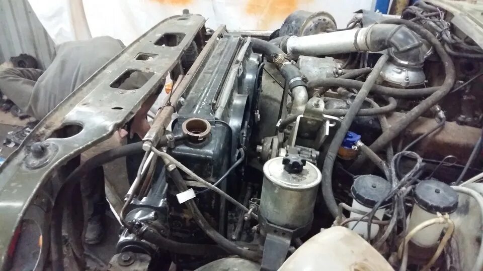 Какие двигателя ставятся на уаз. Двигатель уаз 469. радиатор уаз 469 газ 3110. радиатор от волги на уаз 469. волга радиатор в уаз 469.