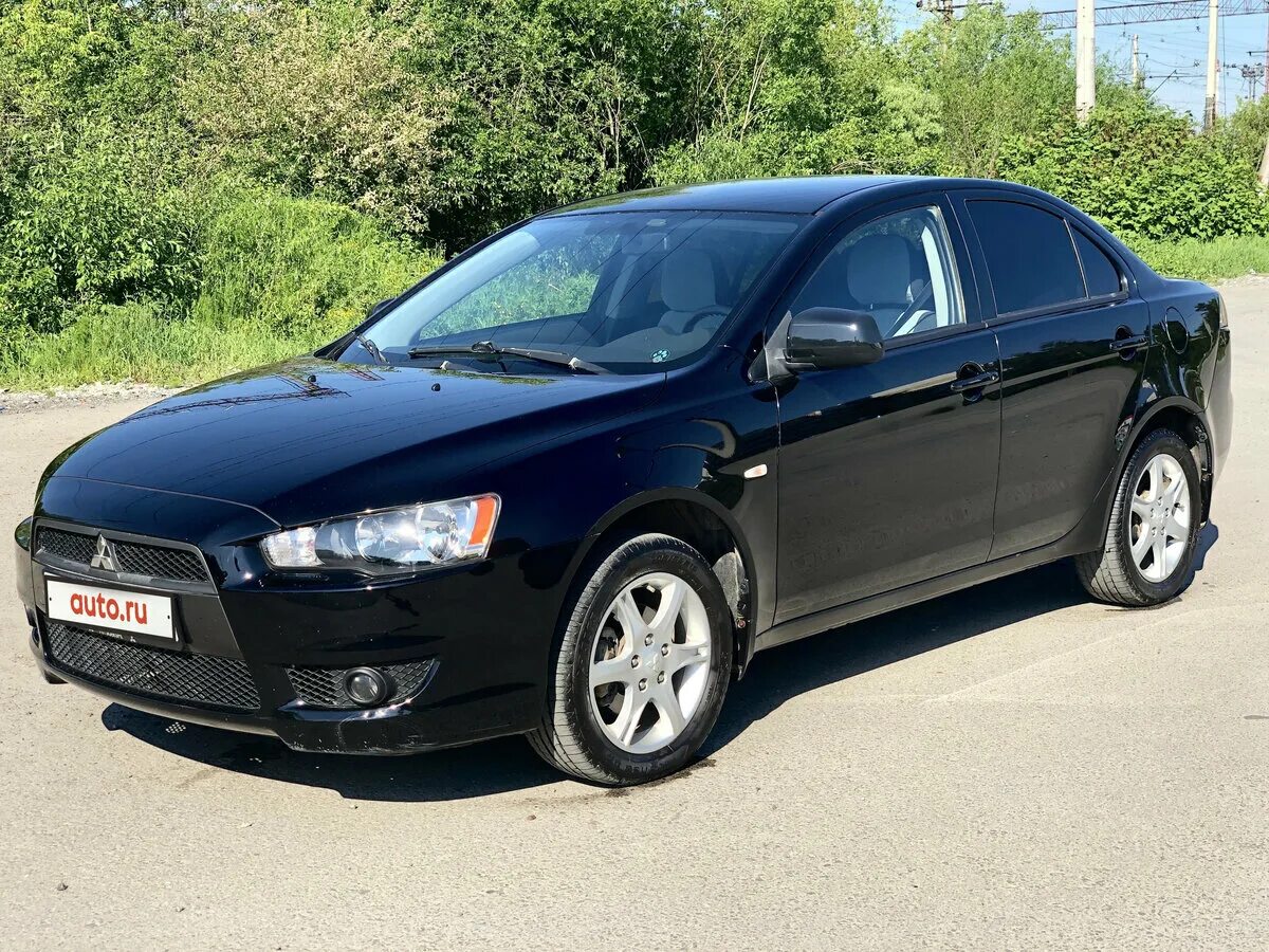 Lancer x 1,5 2010 черный. Мицубиси Лансер 2010 чёрная. Мицубиси ланцер 2010 года. Митсубиси лансер 2010