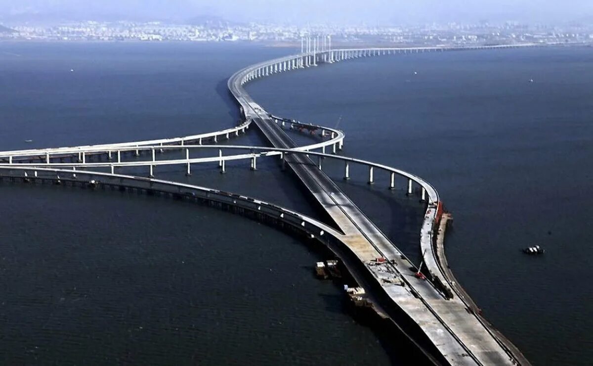 Самый большой конец в мире. Мост Даньян-Куньшаньский виадук. Циндаоский мост в Китае. Самый длинный мост в мире Даньян-Куньшаньский виадук. Мост Ханчжоу Бэй.