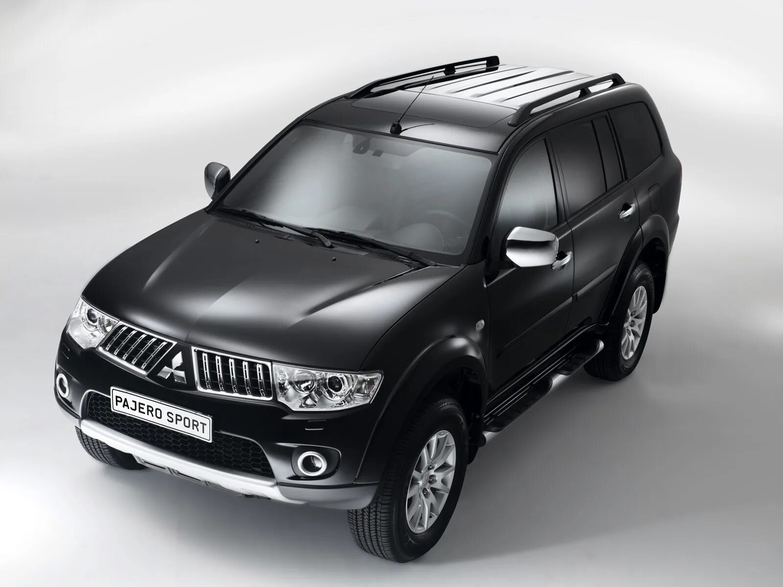 Mitsubishi pajero sport 2008 2015. Mitsubishi pajero sport 2. Mitsubishi pajero sport внедорожник синий. Mitsubishi pajero sport белый 2011. Паджеро спорт 2 2008.