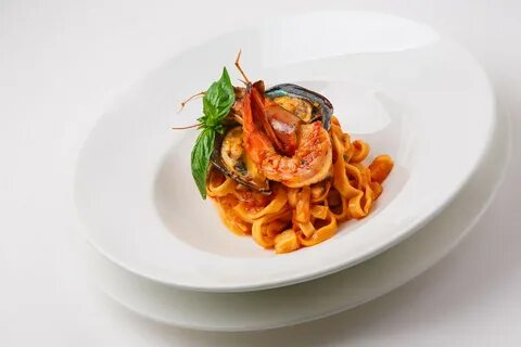 Морепродукты в томатном соусе