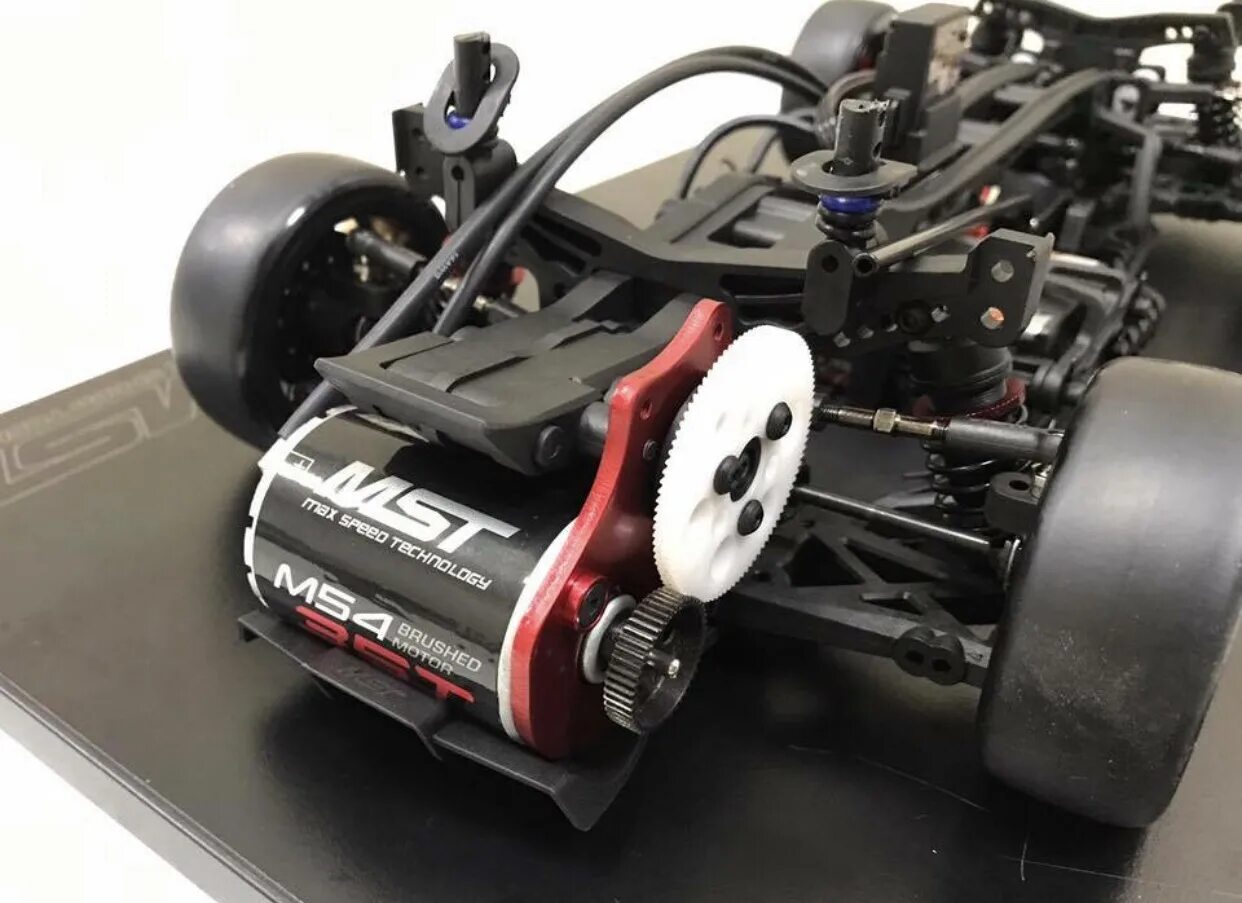 задняя подвеска tesla model s. Sakura d4 rwd конверсия. гирбокс yokomo yd2 ex. Mst rmx 2. мст fxx 2.