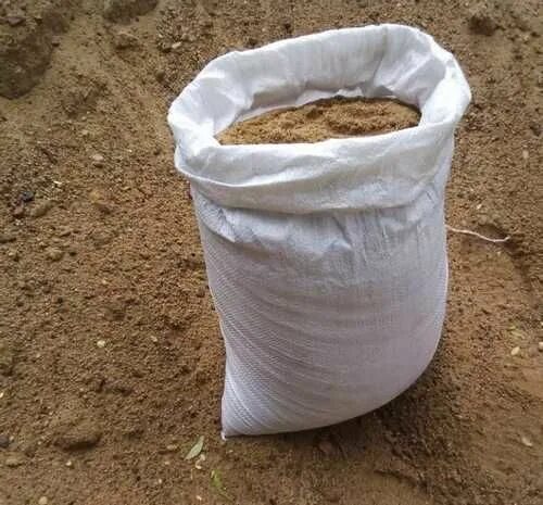 Песок речной сеяный в мешках. 45 кг. Песок фасованный в мешках 25 кг. Песок щебень в мешках. Песок для стяжки в мешках.