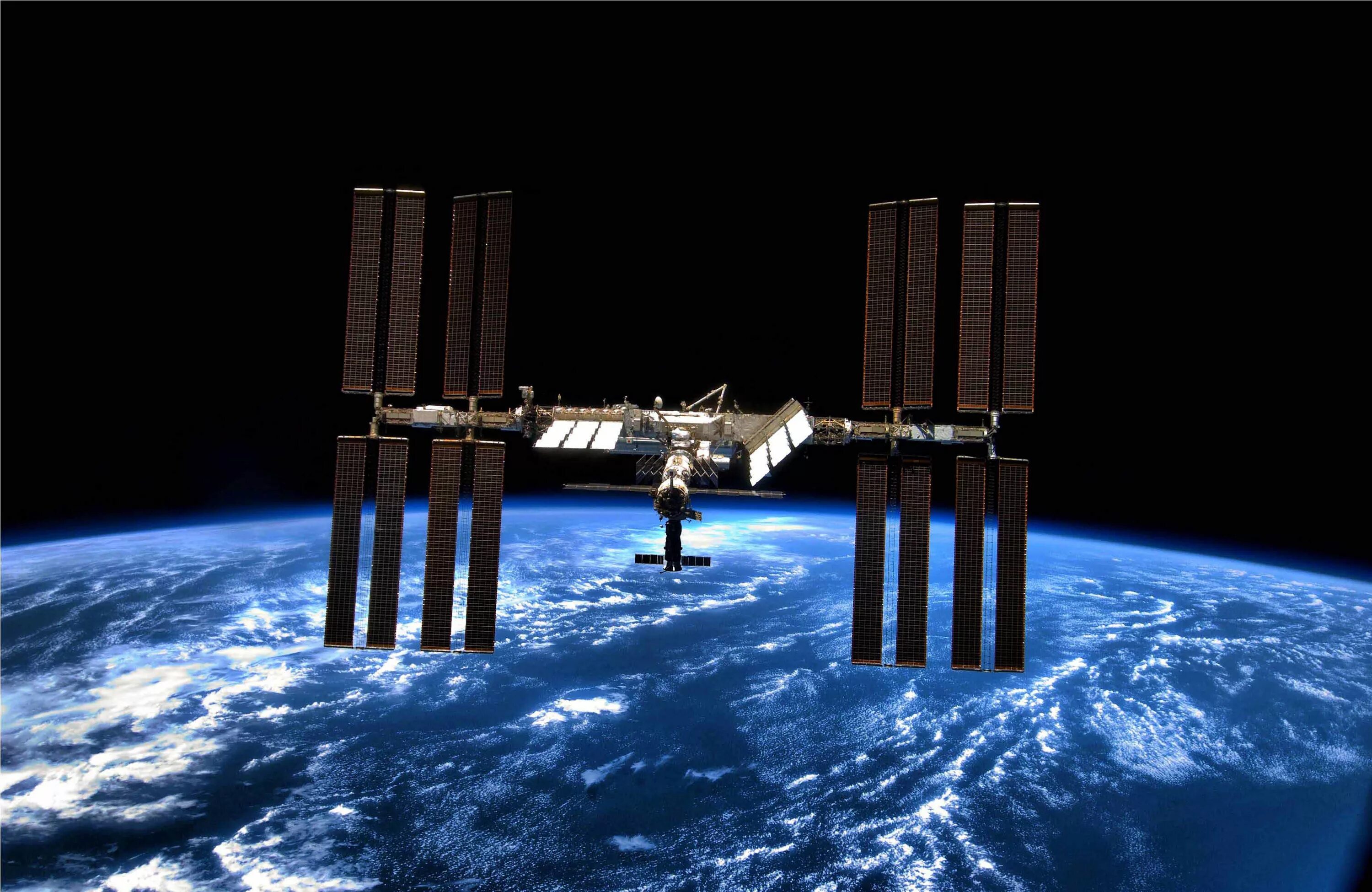Мкс фото. Международная Космическая станция МКС. Международная Космическая станция ISS. Станция МКС В космосе. МКС 2009.
