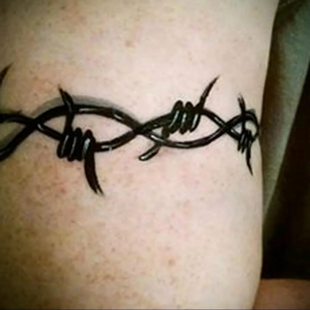 ключевая проволока тату. что означает колючая проволока тату на руке. тату колючая проволока на руке. тату браслет на руке колючая проволока. тату колючая проволока на руке.