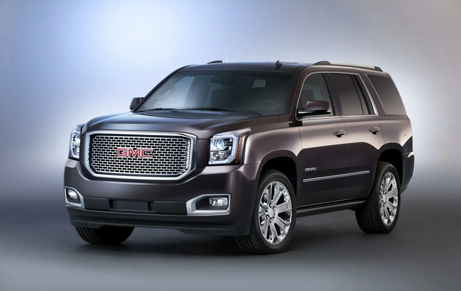 Автомобиль gmc. 2015 GMC Yukon Denali. GMC Yukon XL Denali 2015. Внедорожник GMC Yukon Denali. Chevrolet Tahoe 2015 GMC Yukon Denali.