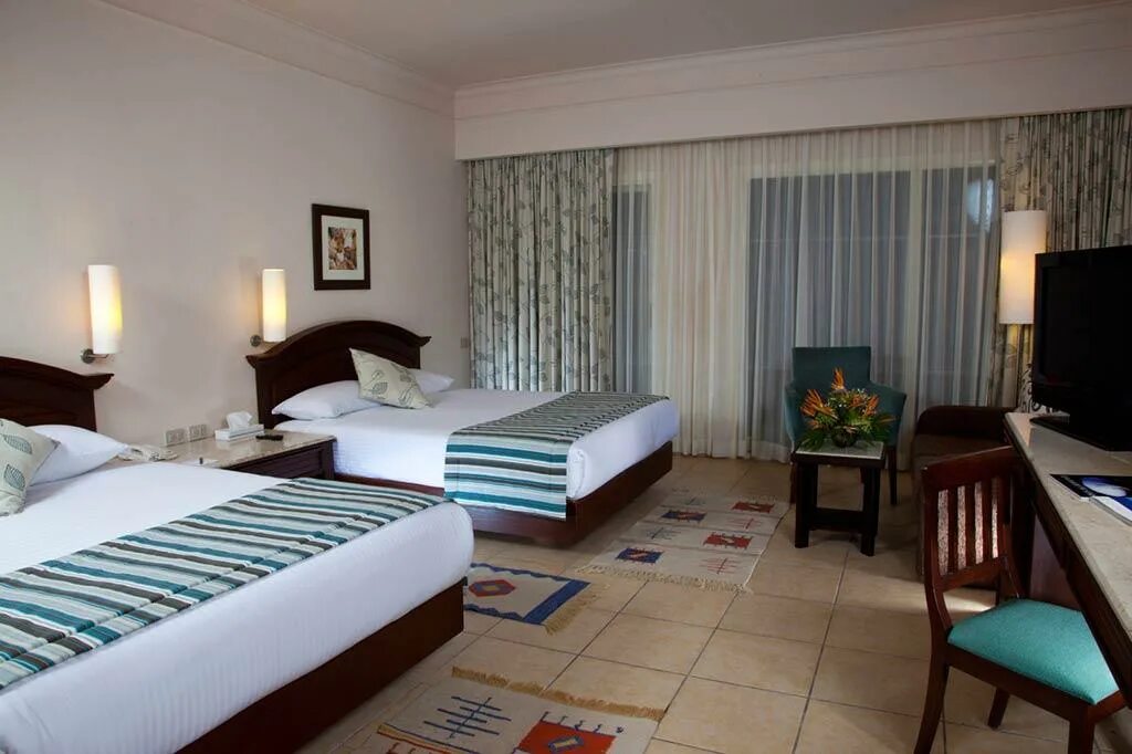 Coral rotana resort. Coral Beach Hotel Hurghada 4. Ротана Хургада отель Корал Бич. Coral Beach Rotana Resort 4 Египет Хургада. Coral Beach Hotel Resort 5 Хургада.