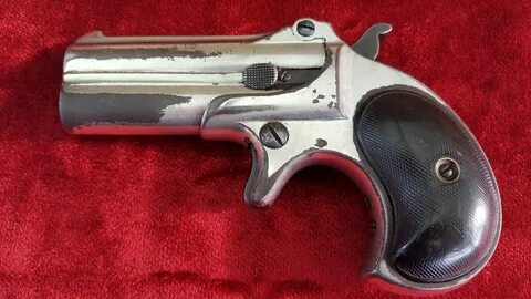 X X X SOLD X X X An antique Remington .41 rimfire double barrelled over.