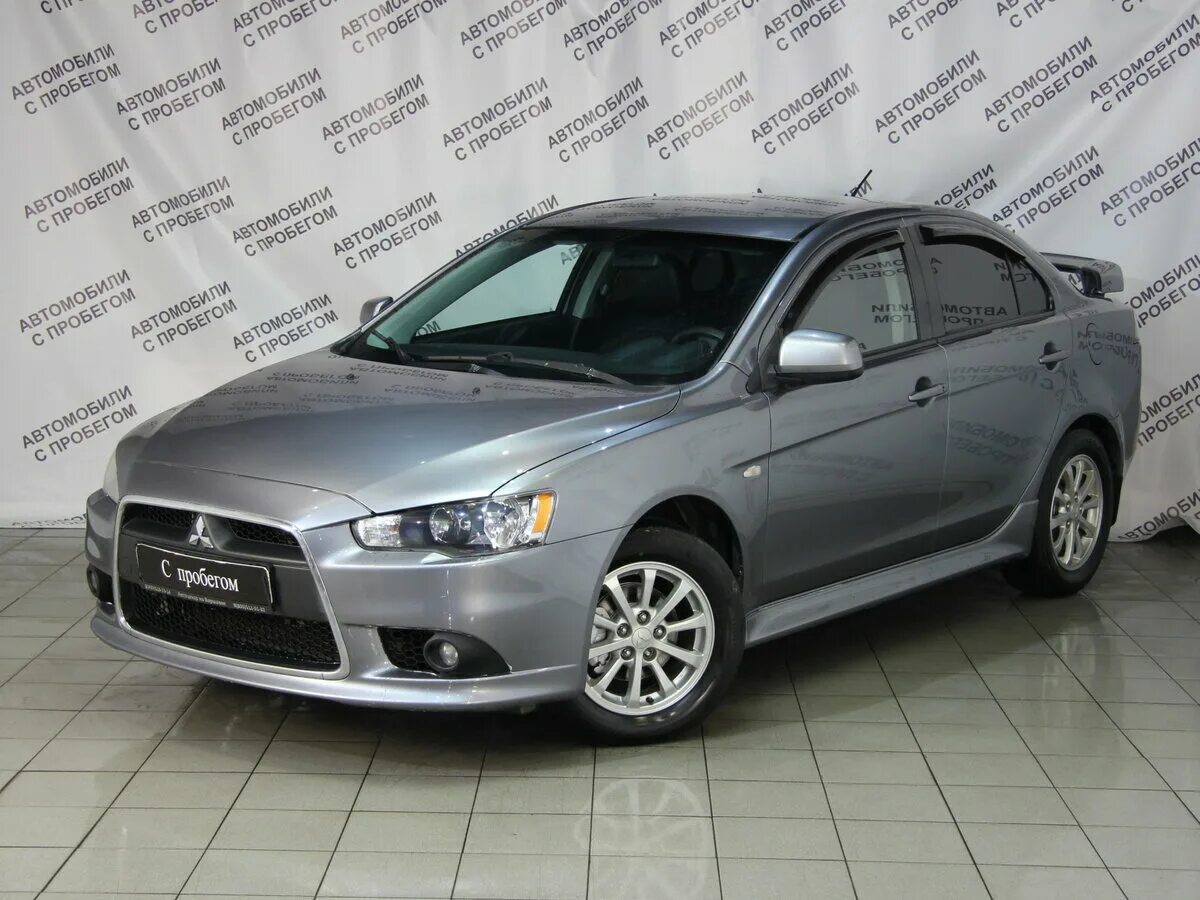 Митсубиси 10 бу купить. Mitsubishi Lancer x Рестайлинг 2012. Лансер 2013 1.6 автомат. Mitsubishi Lancer x, 2013 года. 1.6 At Лансер.