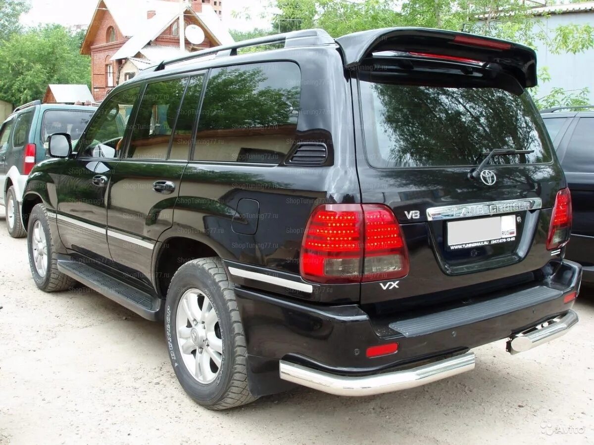 Бампер задний ленд крузер 100. Тойота ленд крузер 100 сзади. toyota land cruiser 100 98-. toyota land cruiser 100 bumper. toyota land cruiser 100 2007 сзади.