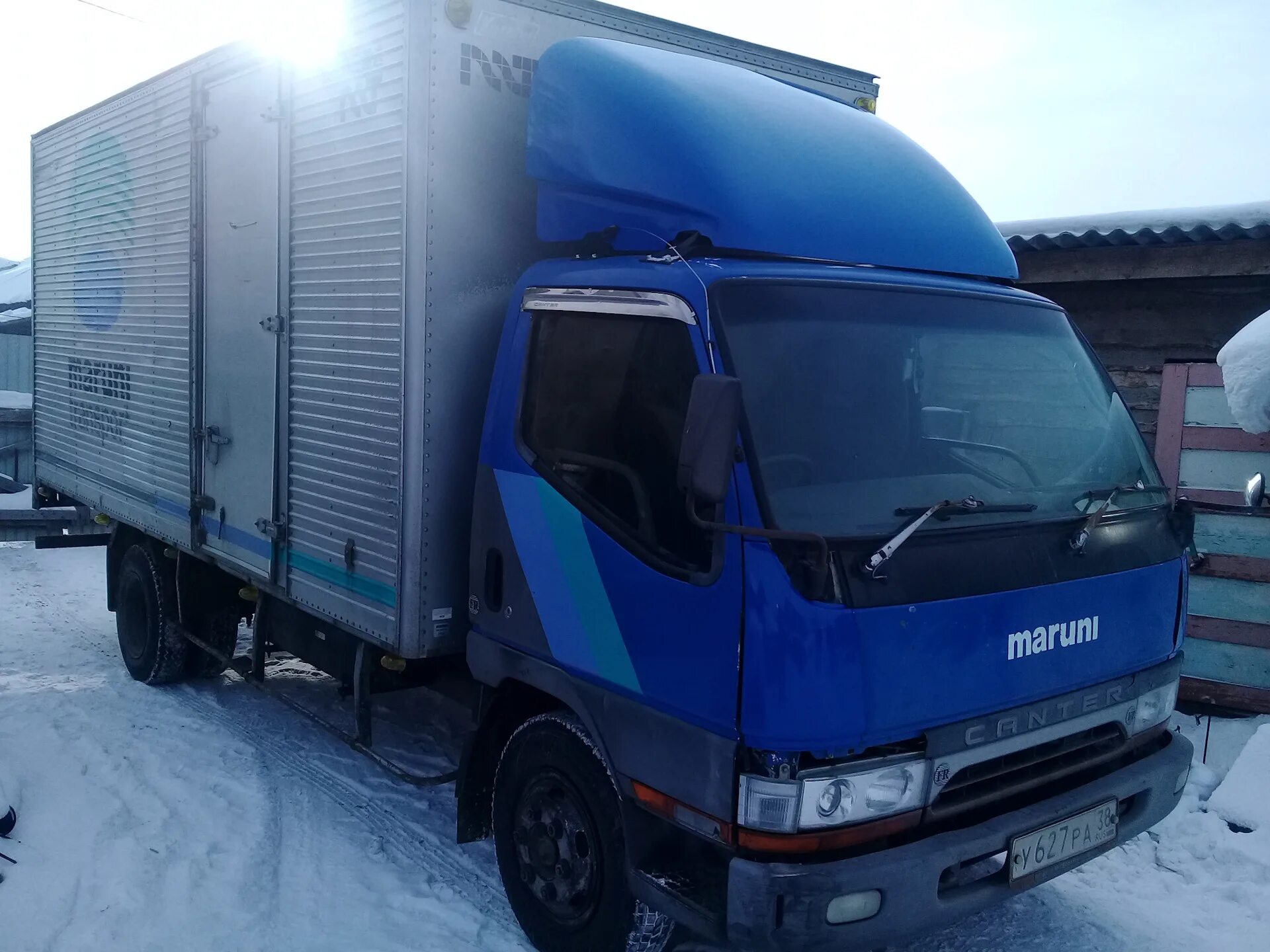 Дром улан грузовики. Isuzu Elf спойлер Исузу. Обтекатель Митсубиси Кантер. Спойлер на Исузу Эльф 1997г. Спойлер на Мицубиси Кантер.