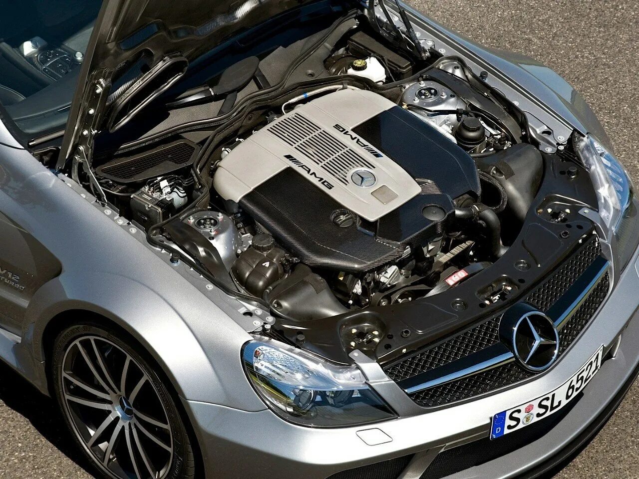Какие двигатели мерседес самые надежные. Mercedes SL 65 AMG v12. Mercedes Benz sl65 AMG Black. Мерседес Бенц АМГ мотор v12. Mercedes Benz v12 Biturbo AMG.