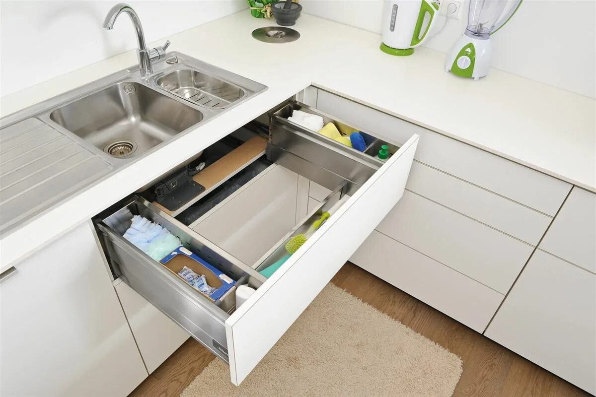 Лоток под мойку. Кухонная фурнитура blum. Разделитель тандембокс blum. Мусорное ведро хеттих выдвижное. Мусорное ведро vauth sagel envi single.