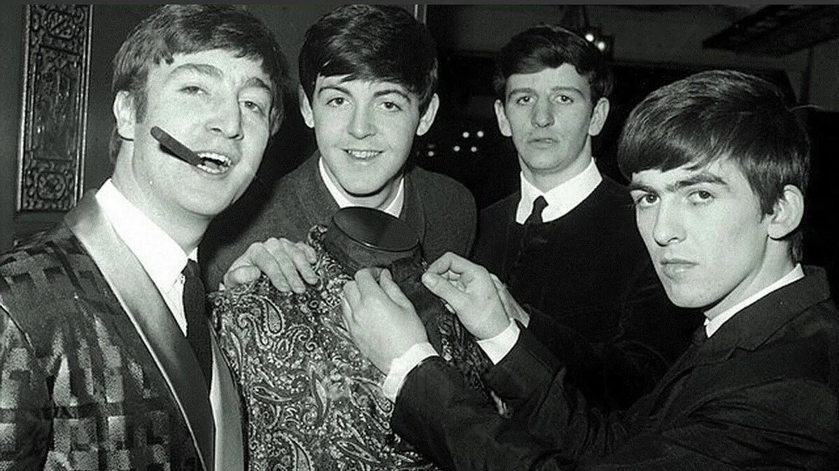The beatles were a famous. Битлз дагестанцы. The beatles презентация. Рукавишников битлз. Рукавишников битлз.