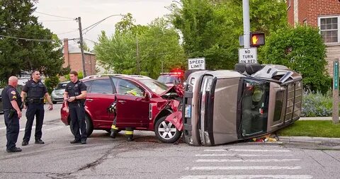 Car accident scene at an intersection.