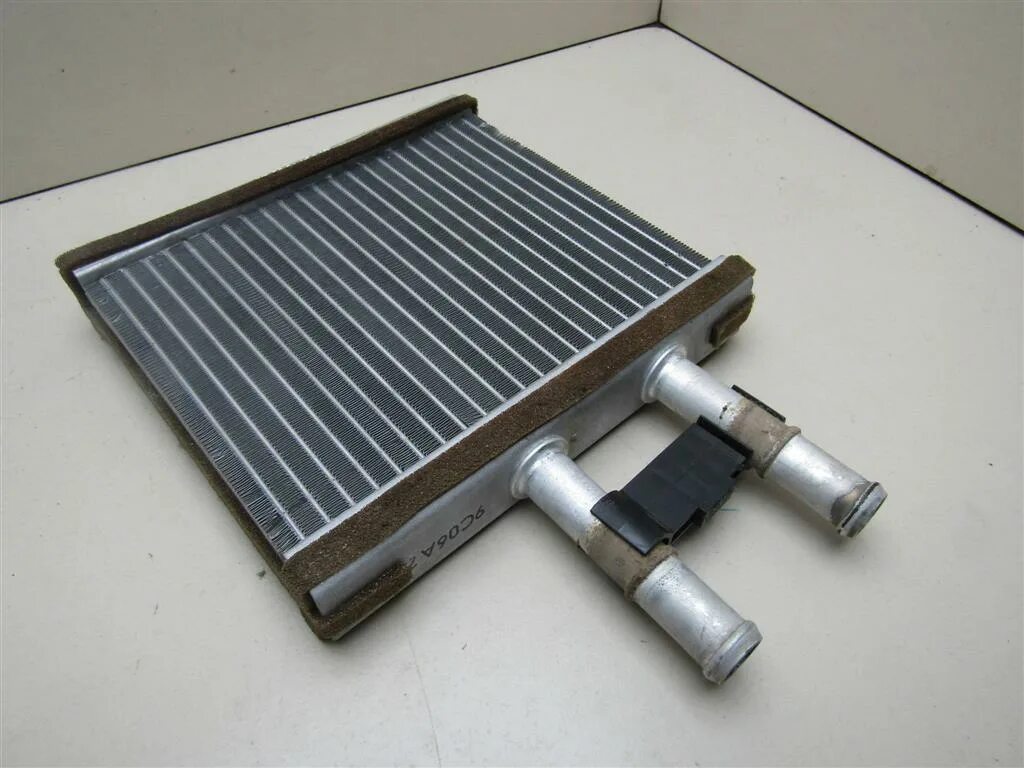 Радиатор печки шевроле ланос. Радиатор печки шевроле авео т250. Радиатор печки шевроле авео т250. Радиатор печки авео т250 1. Радиатор печки шевроле авео.