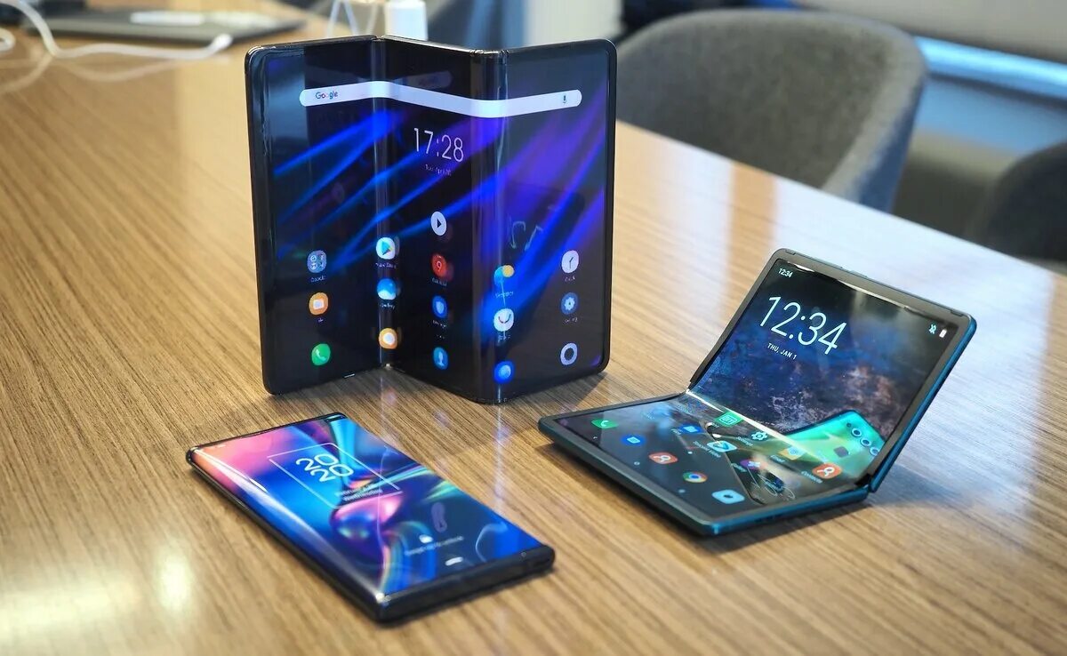 Новая версия самая новая много версий. TCL складной смартфон. Samsung Galaxy Foldable Smart Phone. Раздвижной смартфон TCL. Самсунг 2 экрана 2022.