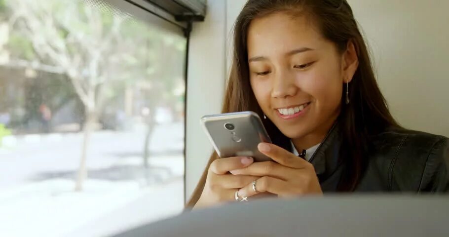 Using your mobile phone. Mobile phone in the bus.