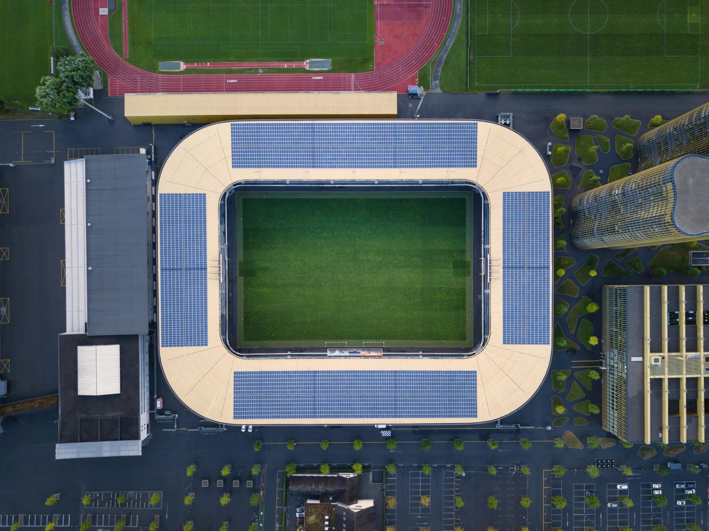 Стадион в квадратных метрах. Кисё Курокава стадион. Стадион Гераклион вид сверху. Стадион вид сверху. Футбольный стадион вид сверху.