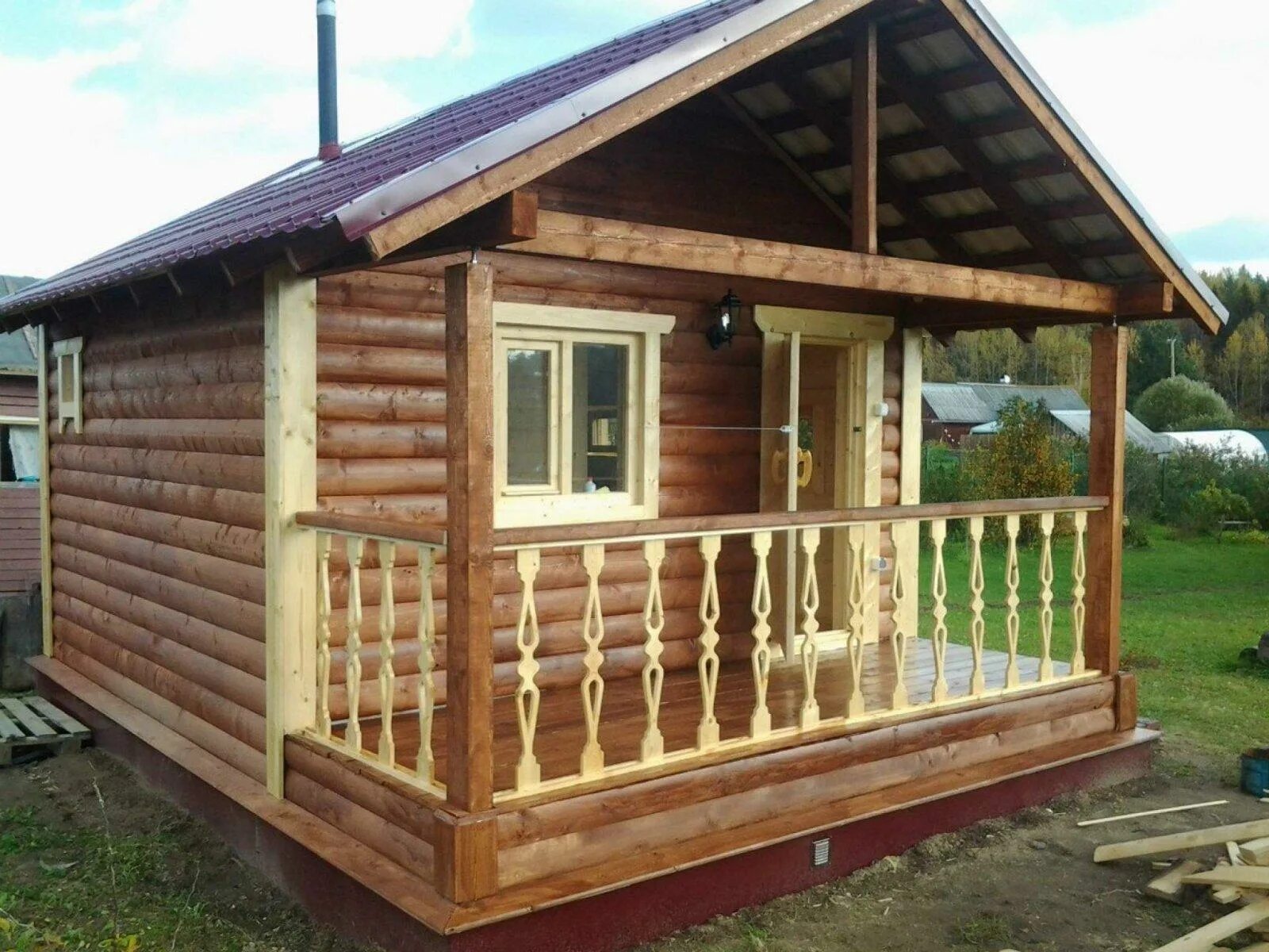 Дом-баня из оцилиндрованного бревна под ключ. Баня под ключ. Рубленная баня с верандой. Дома бани самара. Зодчий бани из бруса под ключ.